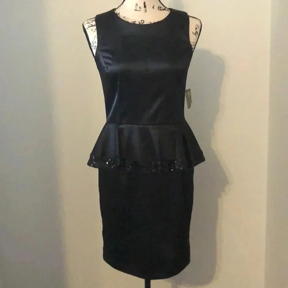 Taylor Black Peplum Dress - Picture 1 of 9